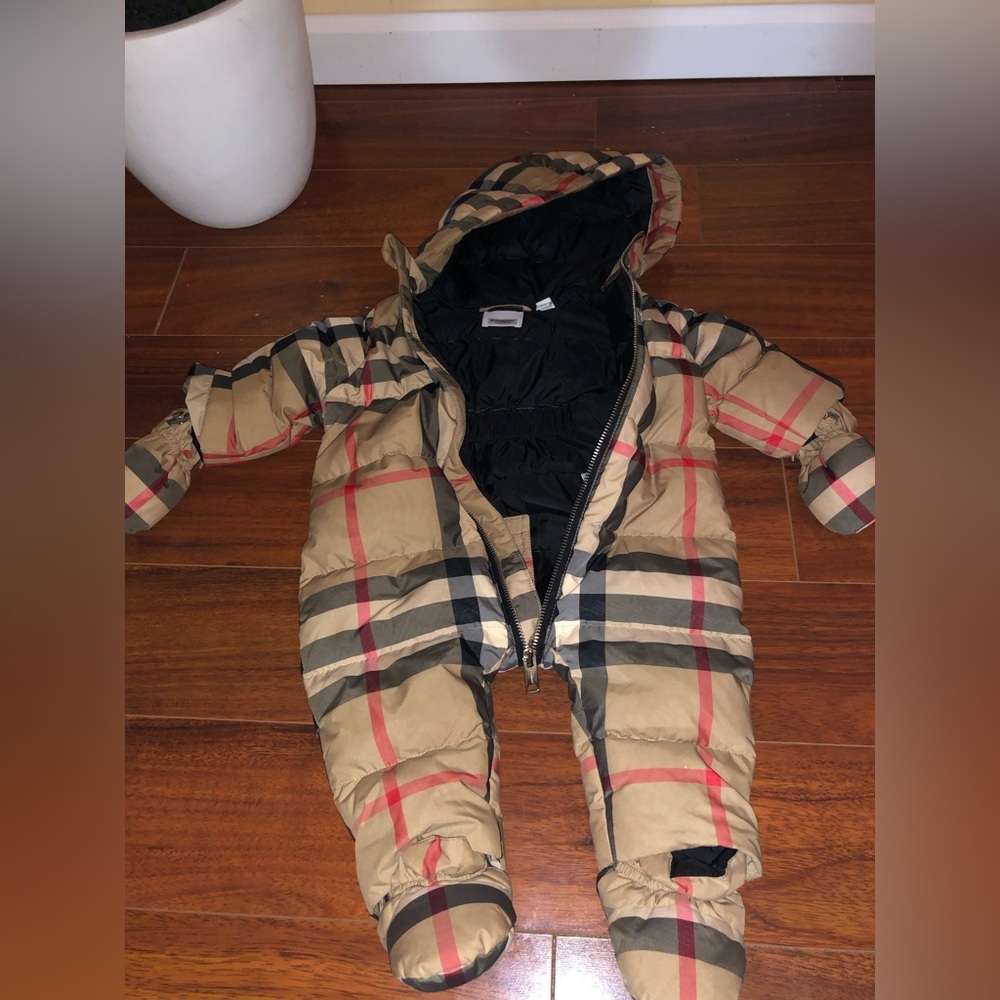 Size 9 months Burberry snow suit. Lightly used. No stains or damage.